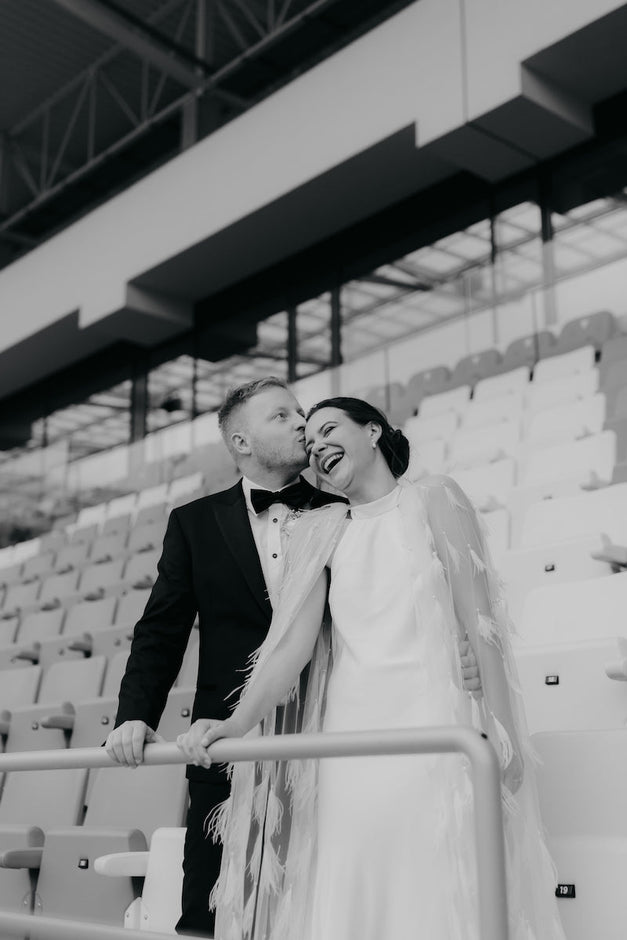 EMA & PETER bride and groom at the football stadium